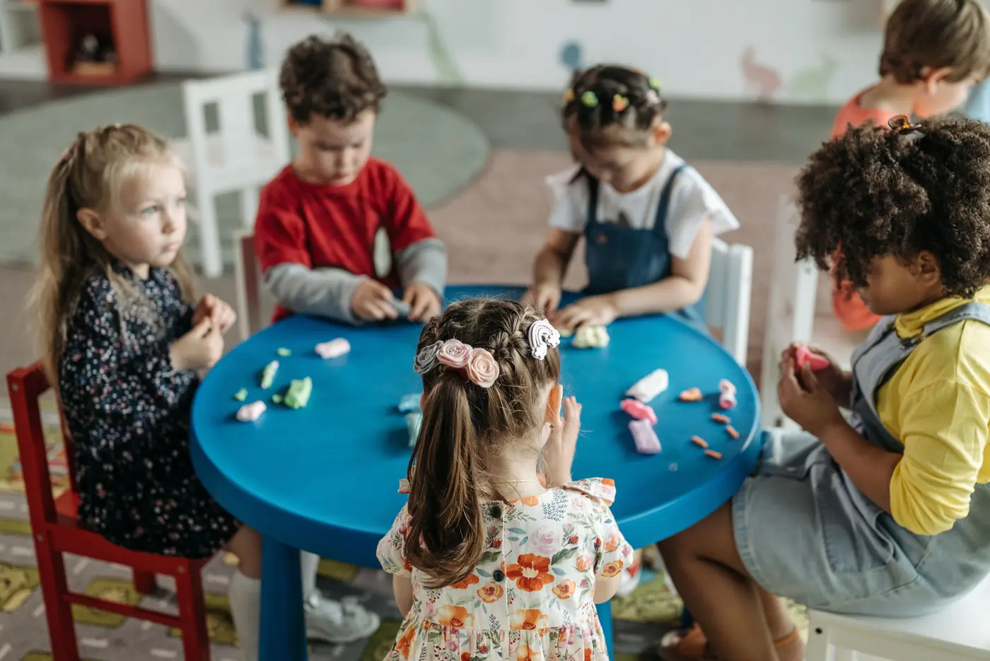 Children learning and playing together at preschool